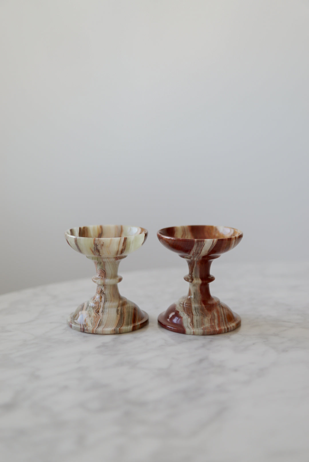 Pair of Onyx Pedestal Candleholders