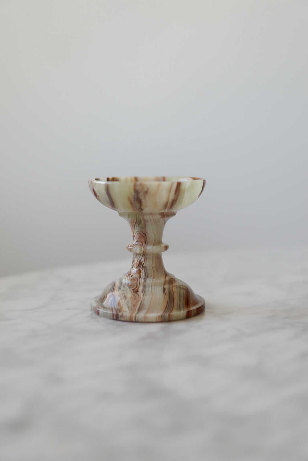 Pair of Onyx Pedestal Candleholders