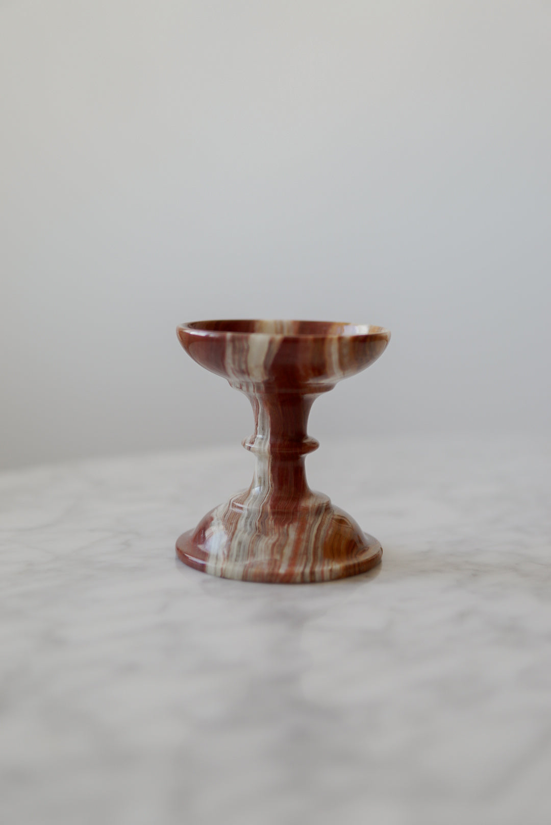 Pair of Onyx Pedestal Candleholders