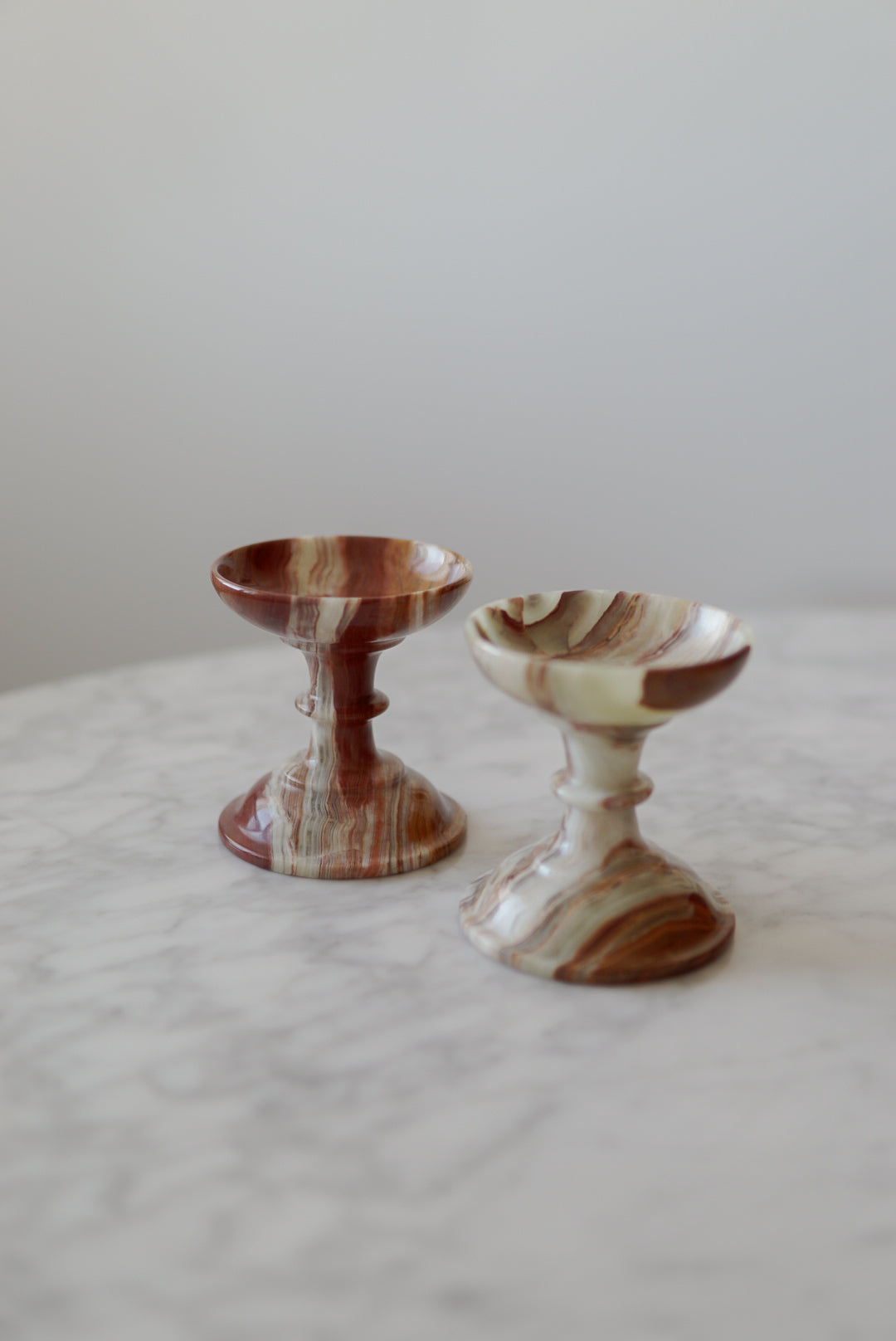 Pair of Onyx Pedestal Candleholders